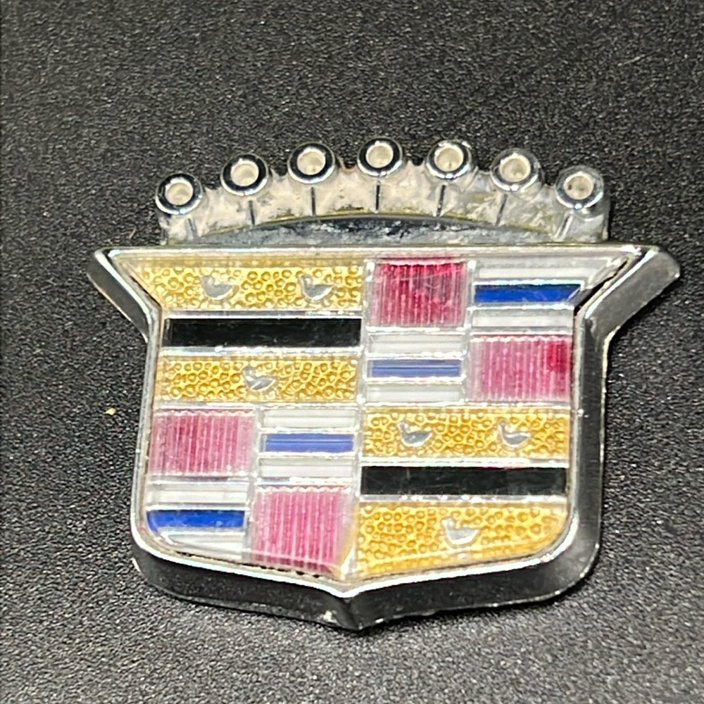 Vintage Cadillac badge emblem